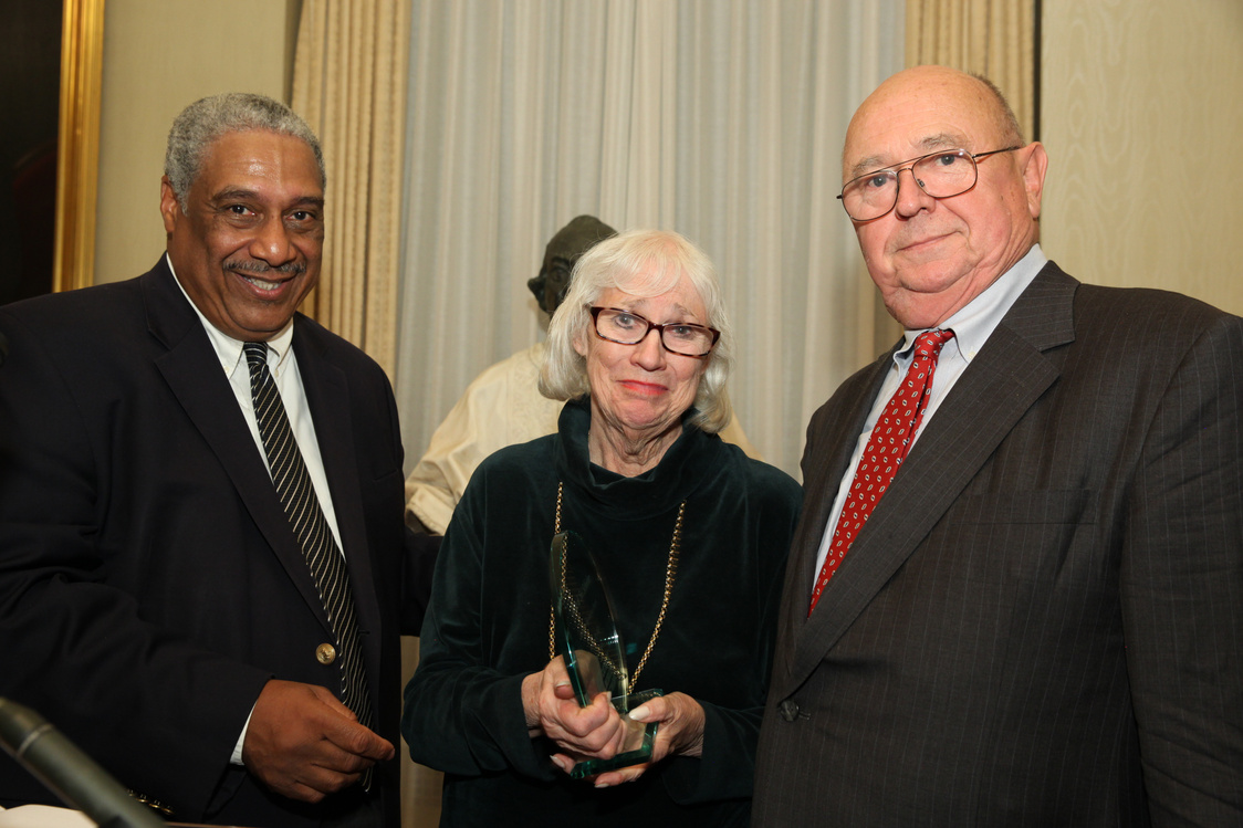 CMN board chair Ralph McCloud with Reimagining Justice Award recipients Syl and Vicki Schieber